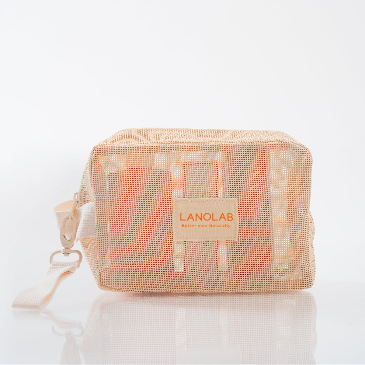 A peach-colored see-through mesh zippered cosmetic bag with a clear front pocket displaying white and orange items items inside, featuring a beige brand label that reads LANOLAB, set against a clean white background.